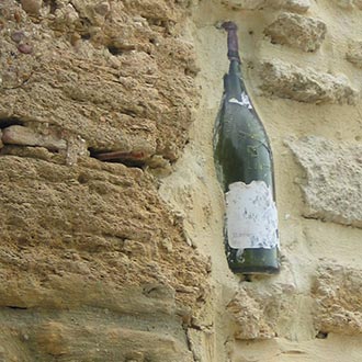 Chateauneuf-du-Pape bottle embedded in wall